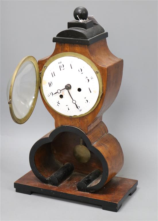 A Biedermeier birch mantel clock 40cm high